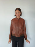 brown leather bomber jacket — size S