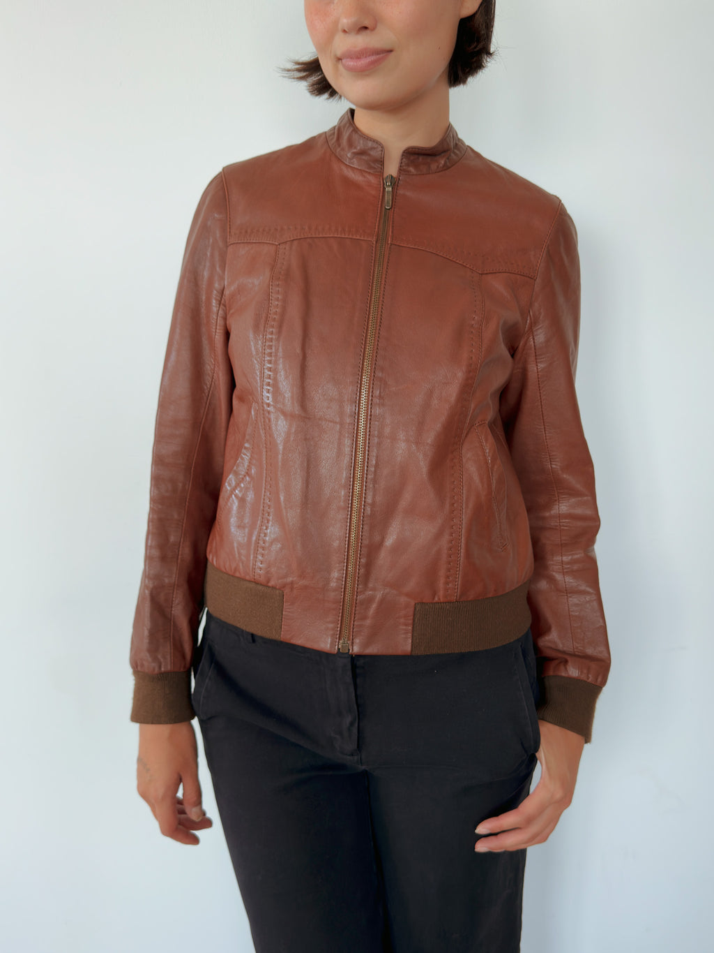 brown leather bomber jacket — size S