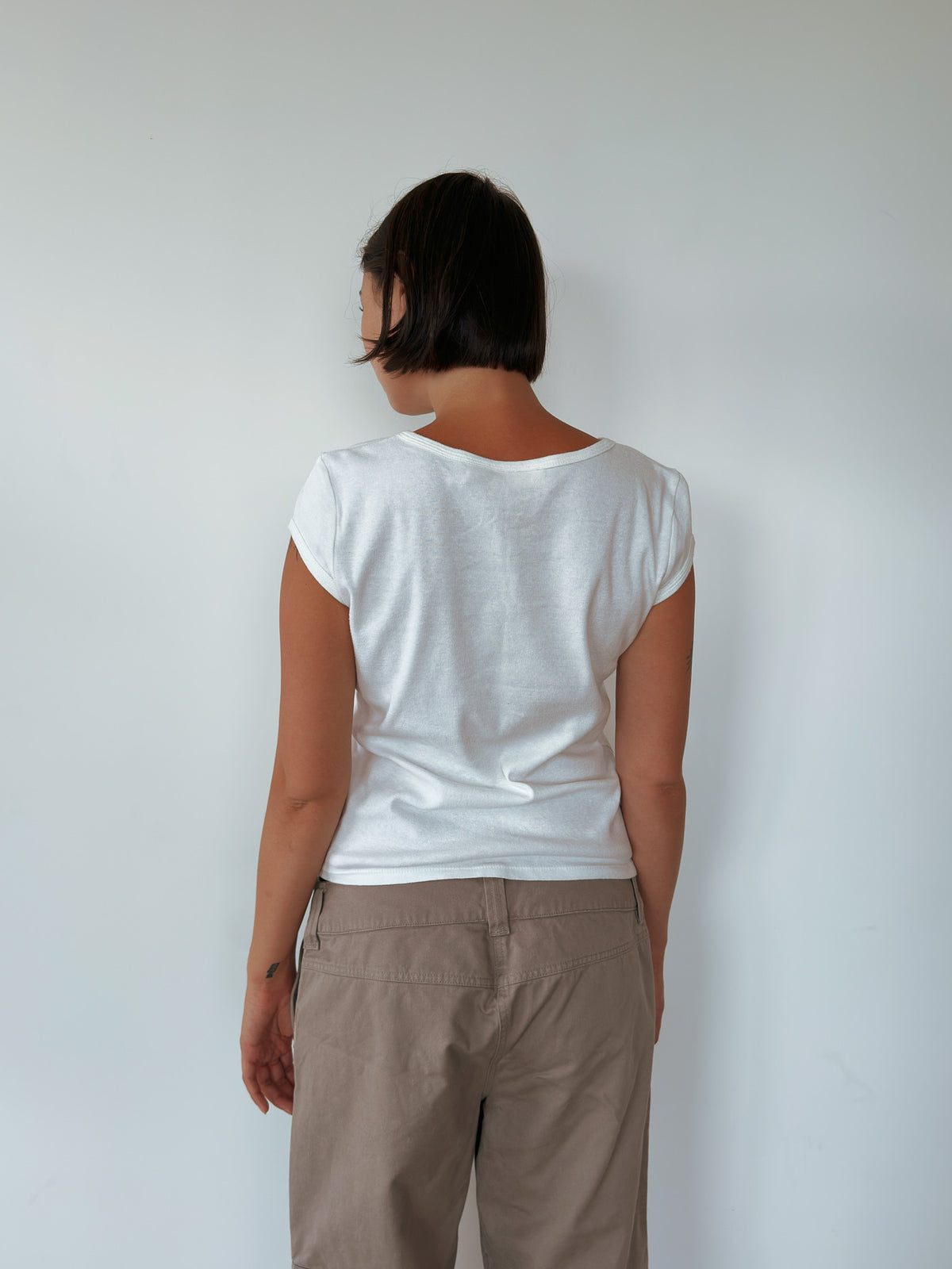 dkny baby tee — size L