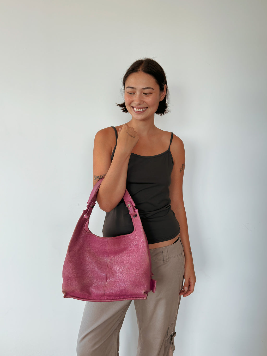 pink leather handbag — one size
