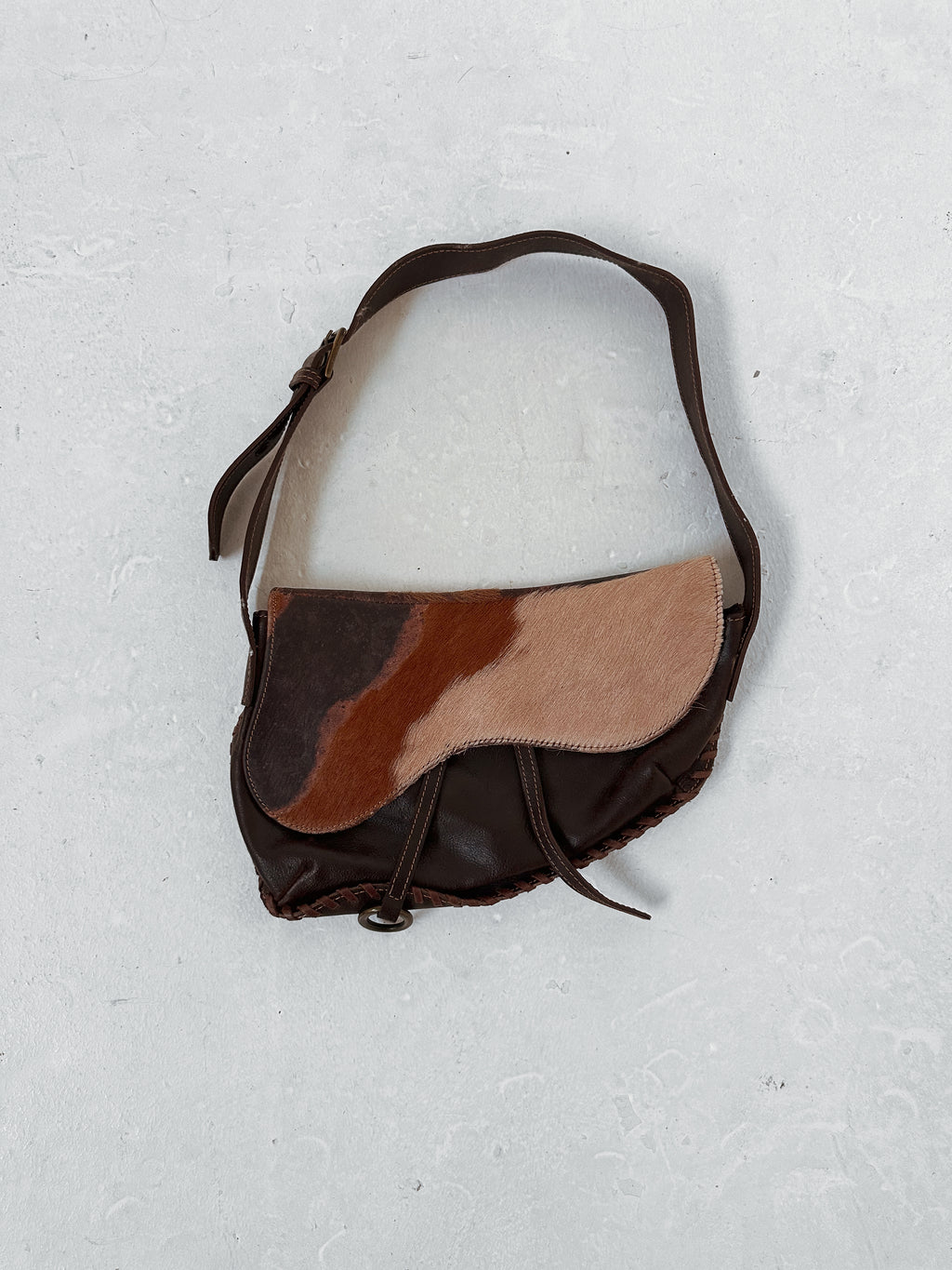 cow hide hand bag — one size