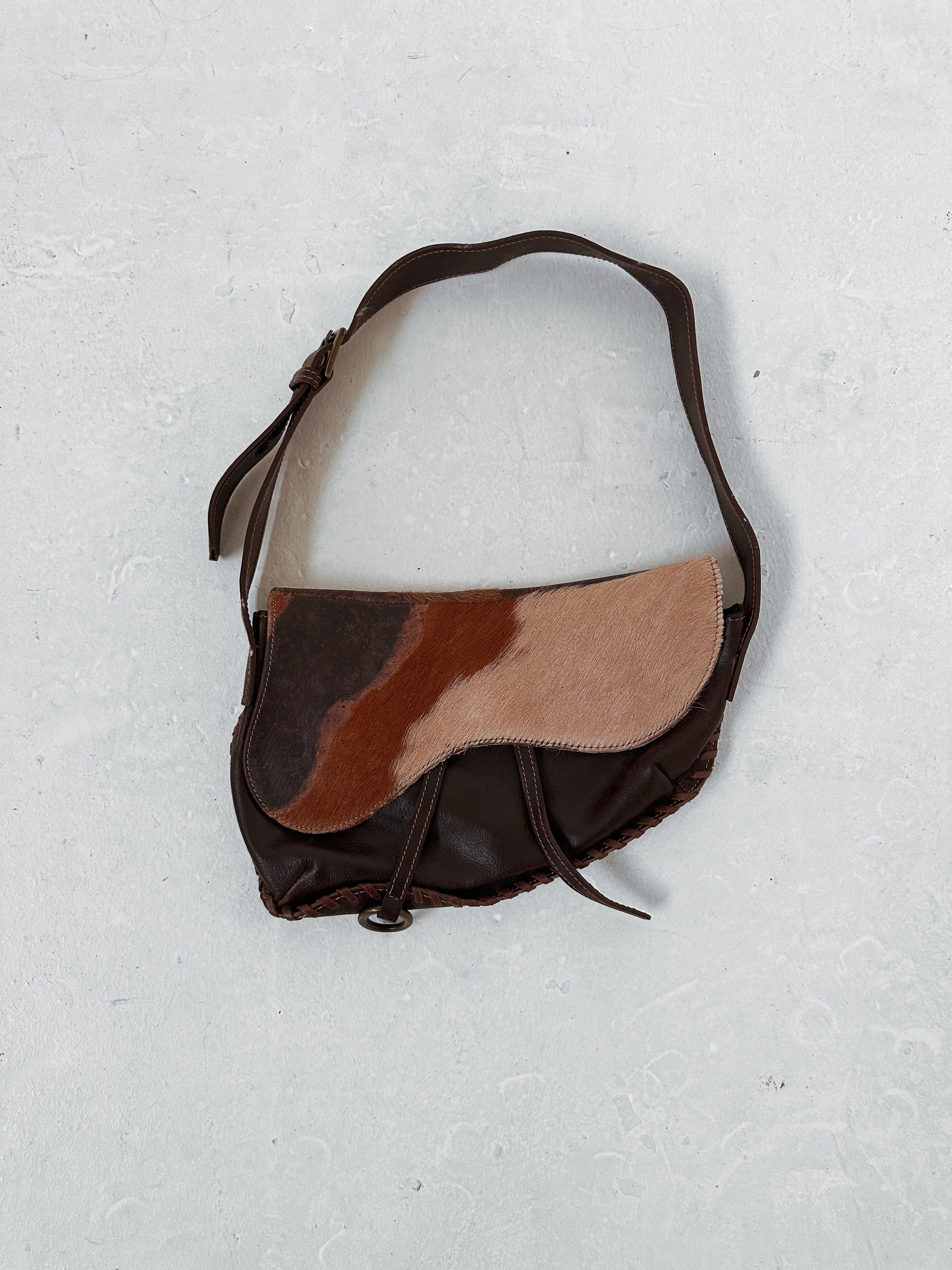 cow hide hand bag — one size