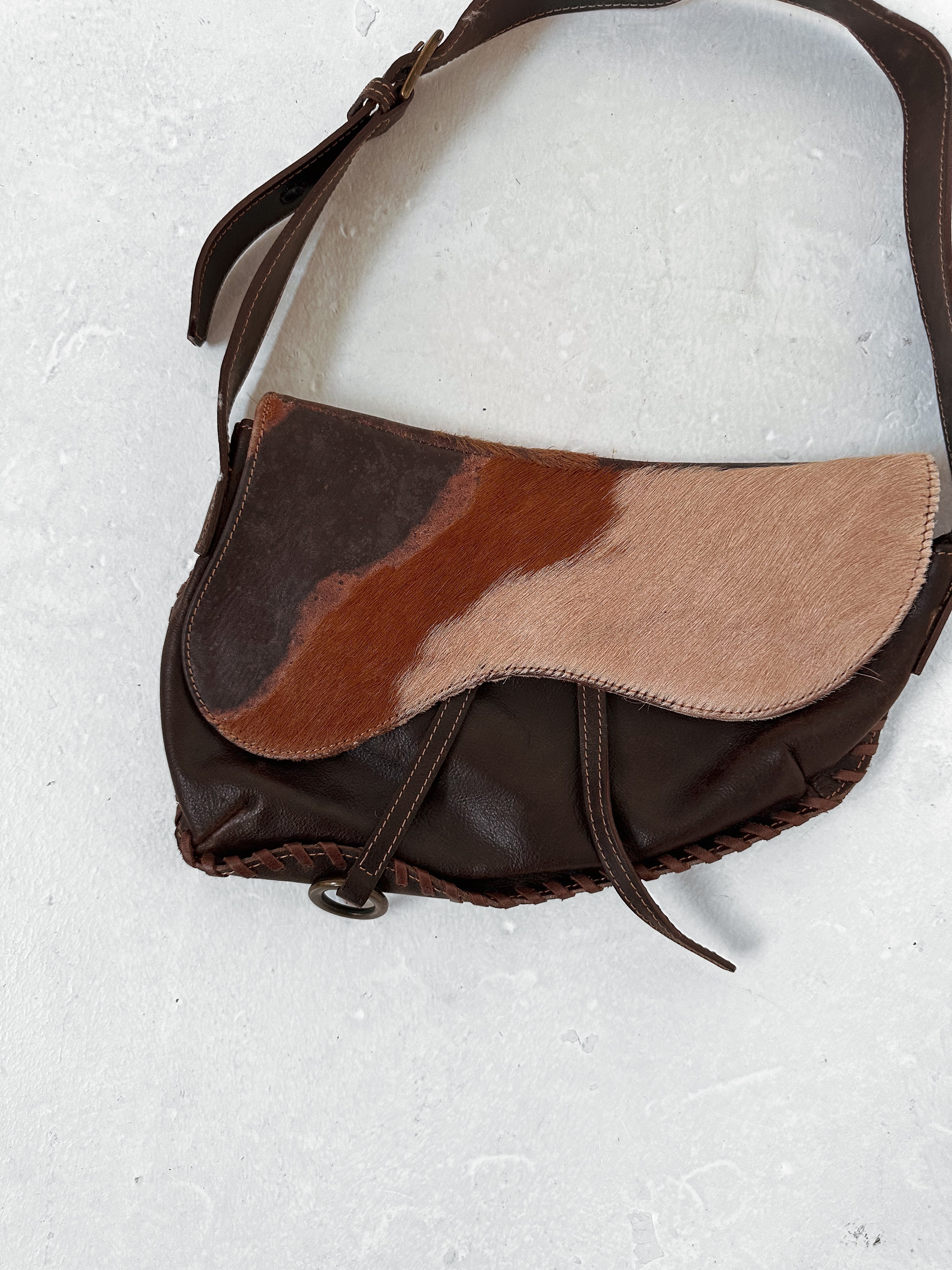 cow hide hand bag — one size