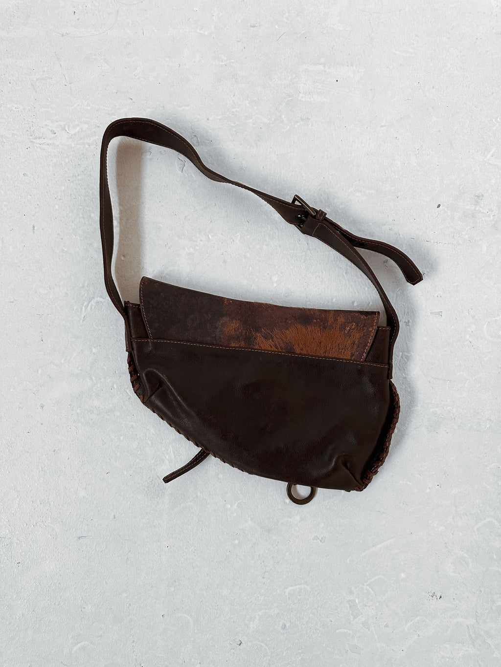 cow hide hand bag — one size