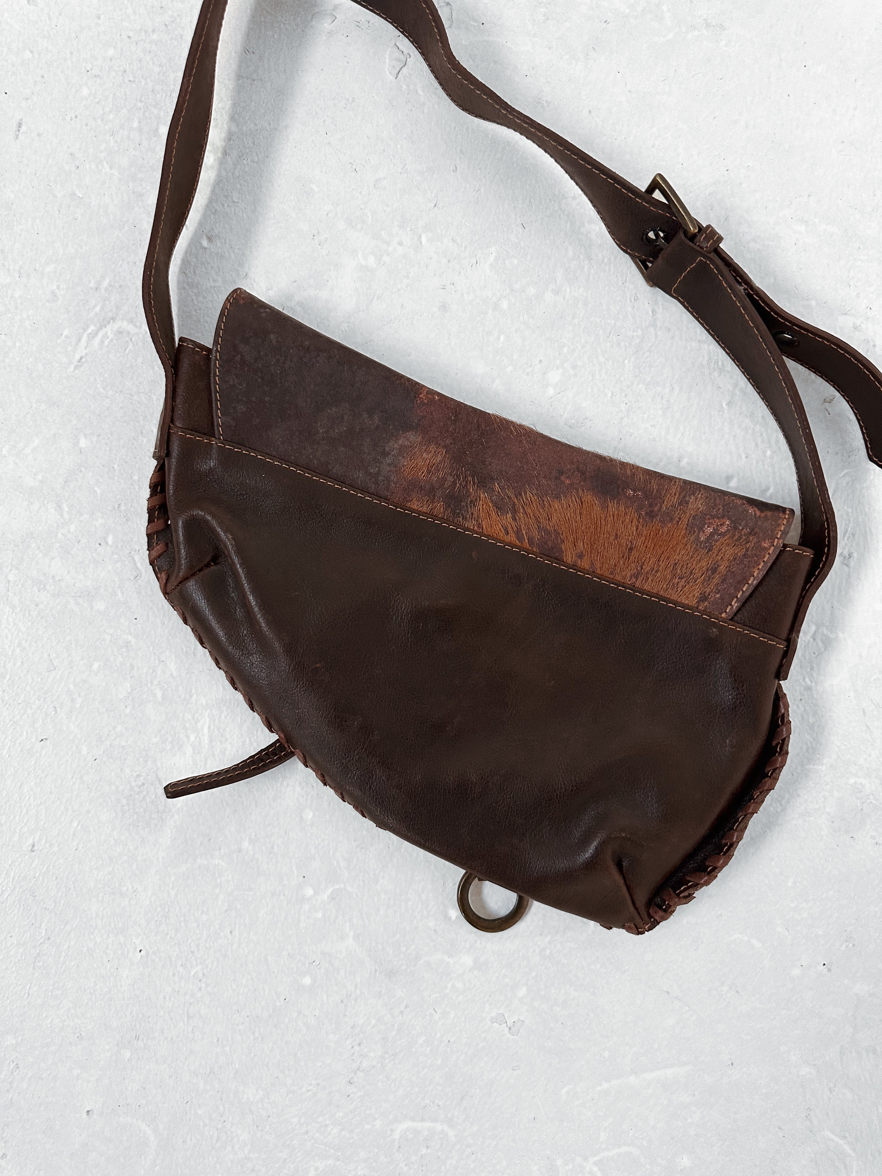 cow hide hand bag — one size