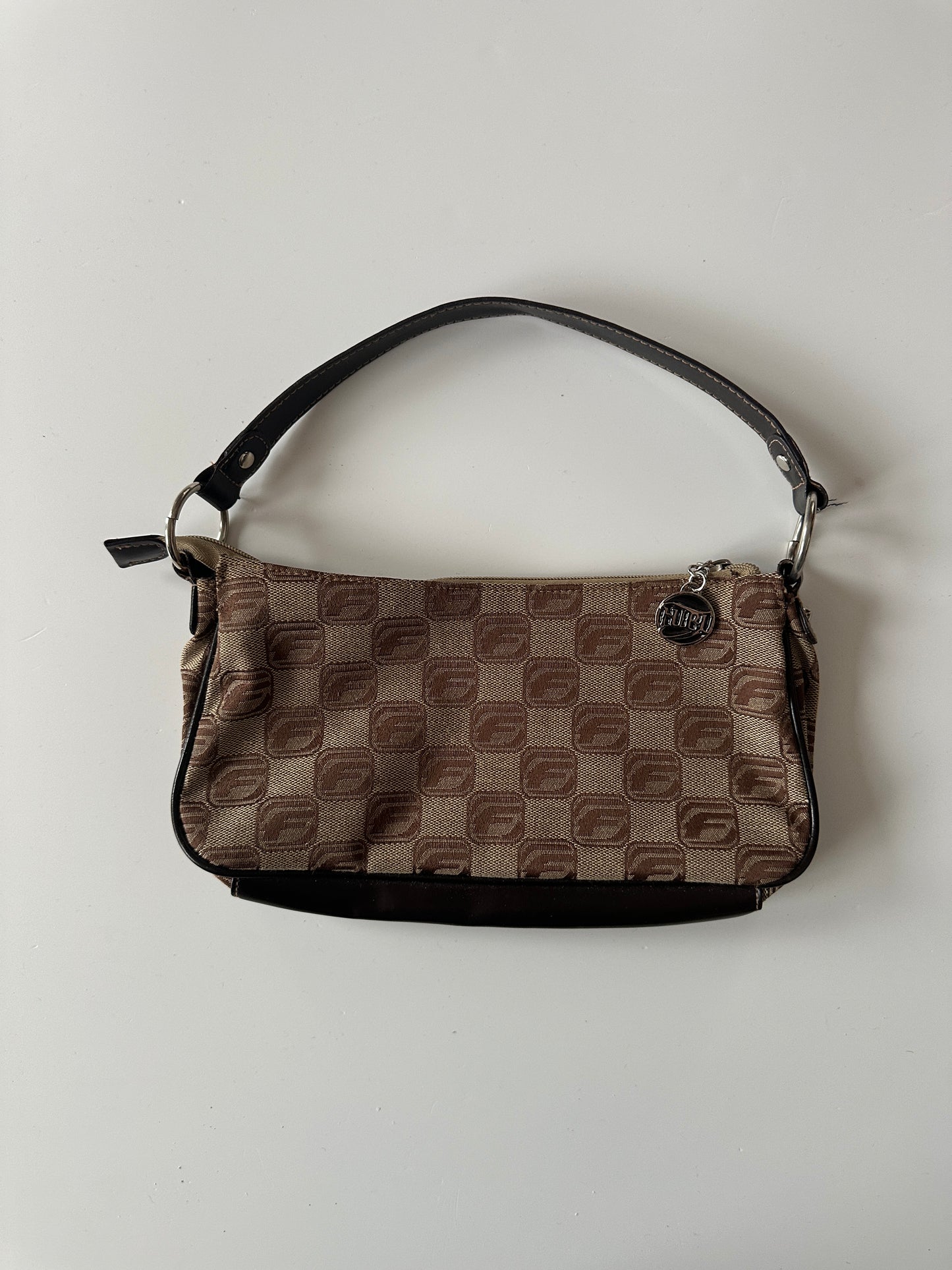 FUBU MONOGRAM BAGUETTE BAG ◦