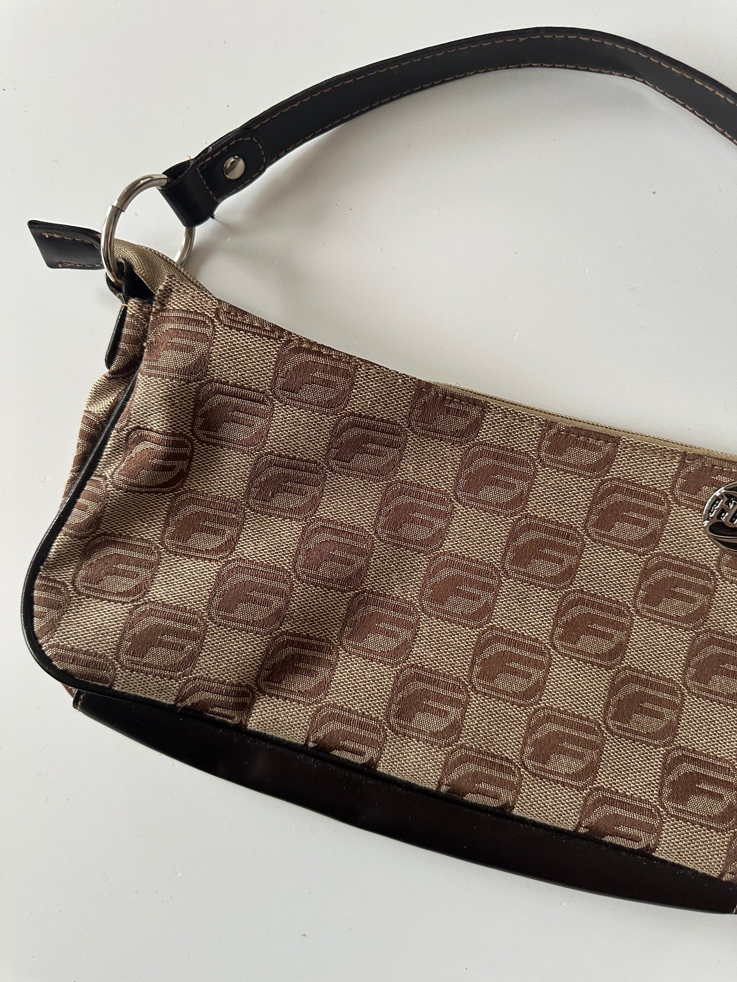 FUBU MONOGRAM BAGUETTE BAG ◦