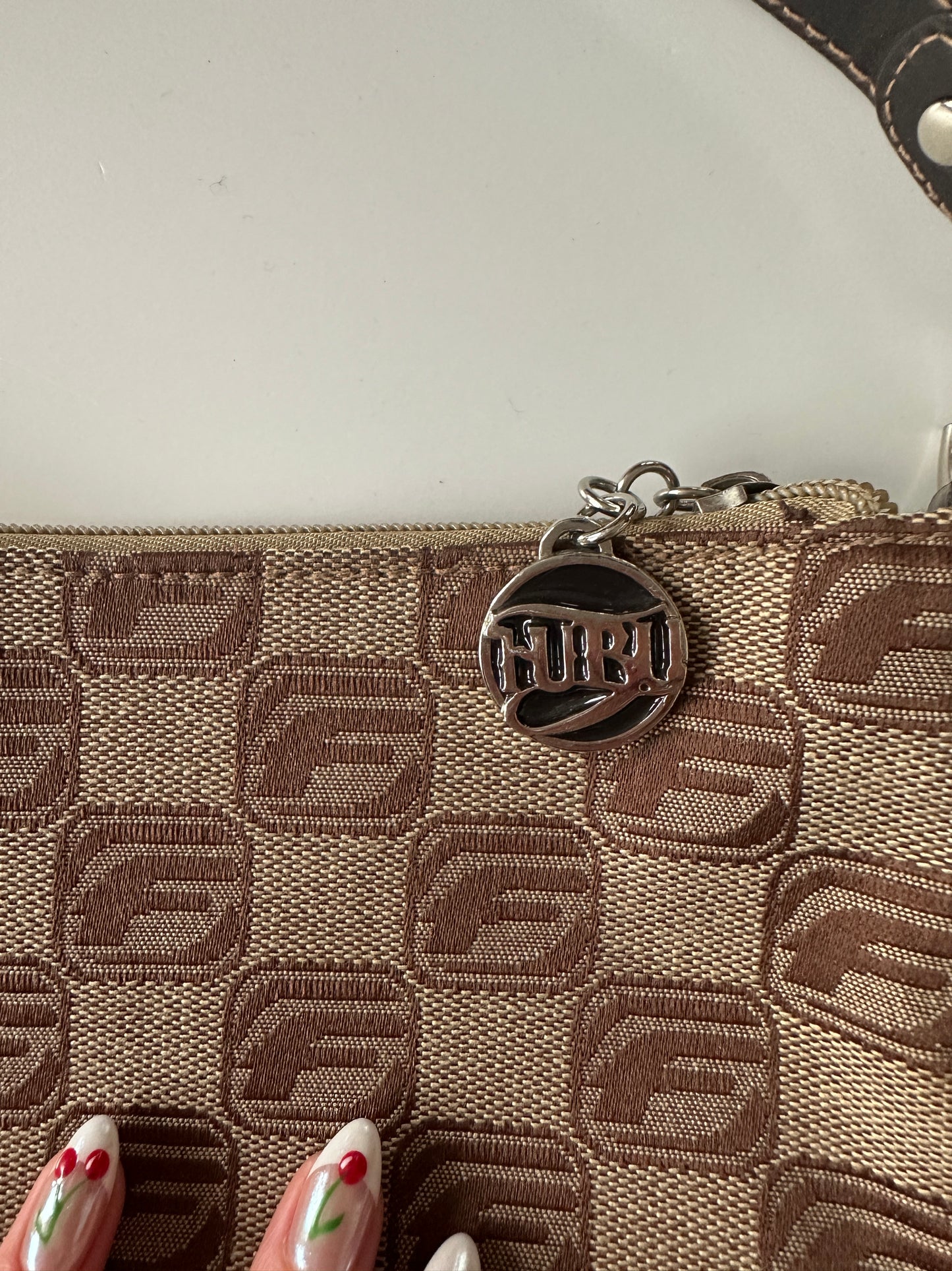 FUBU MONOGRAM BAGUETTE BAG ◦