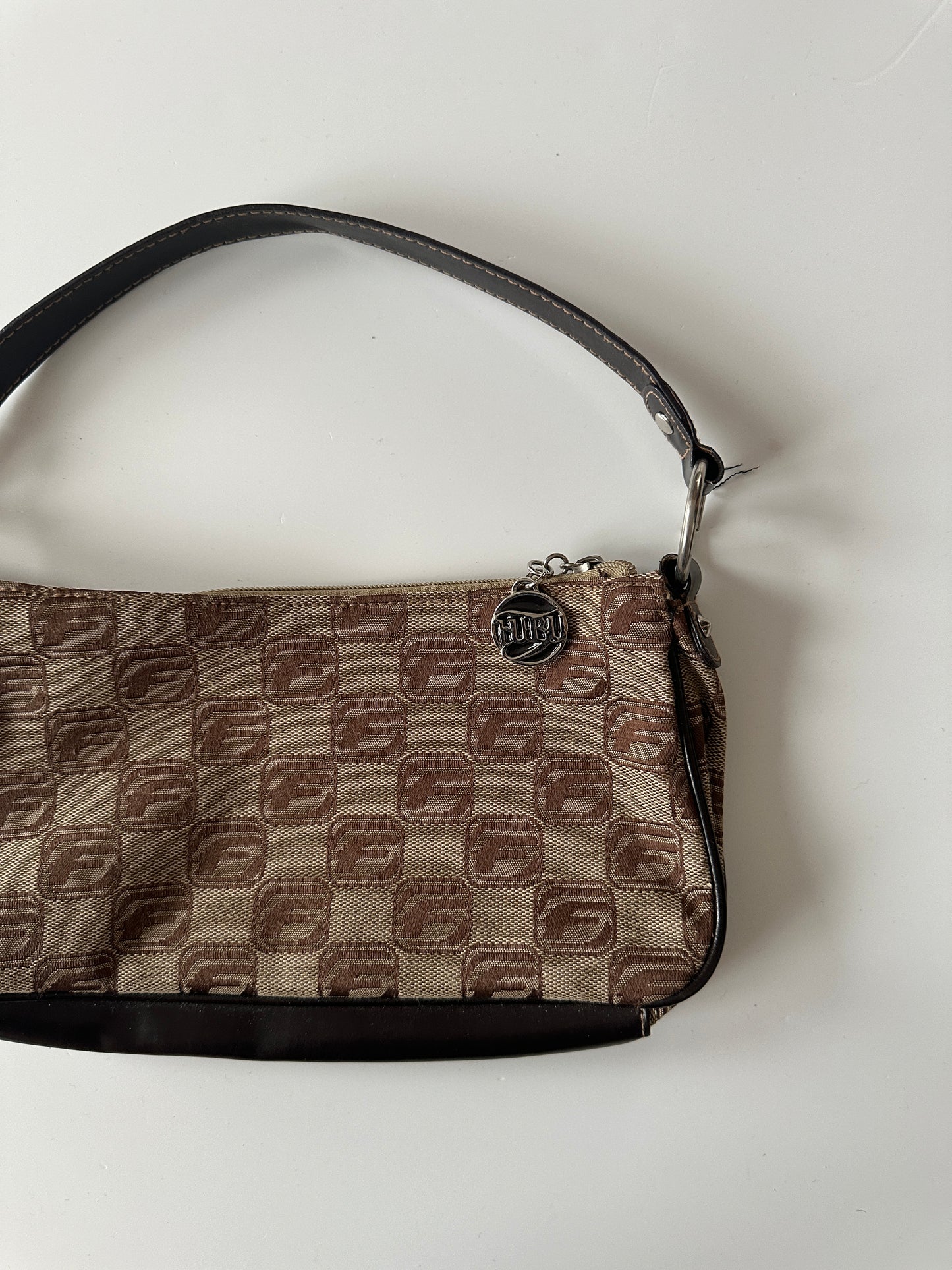 FUBU MONOGRAM BAGUETTE BAG ◦