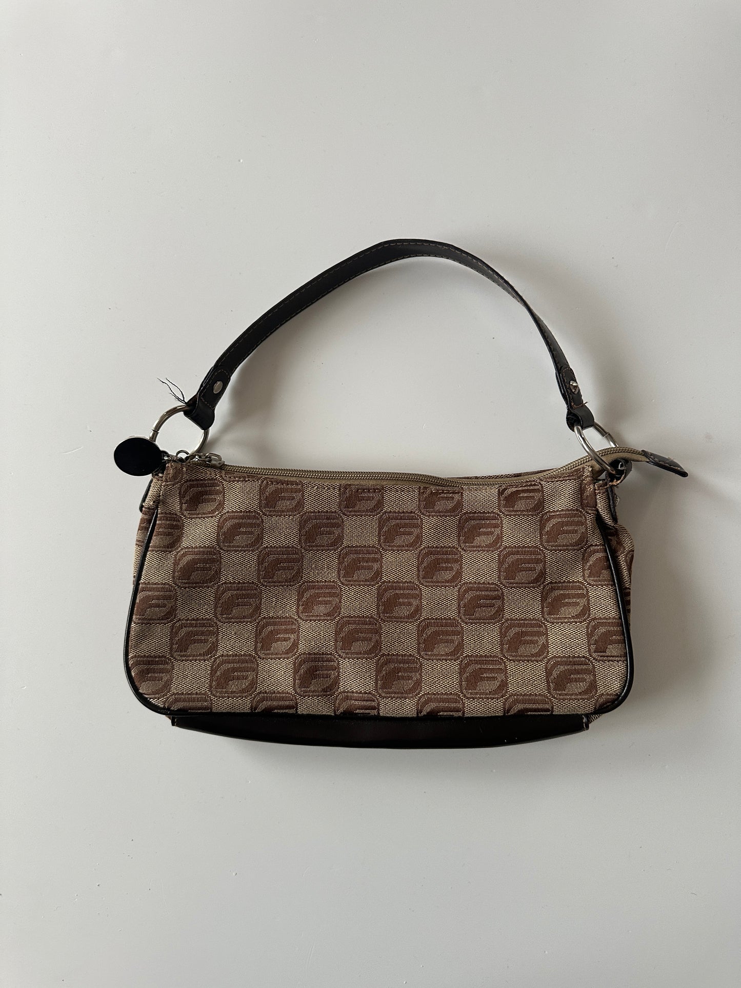 FUBU MONOGRAM BAGUETTE BAG ◦